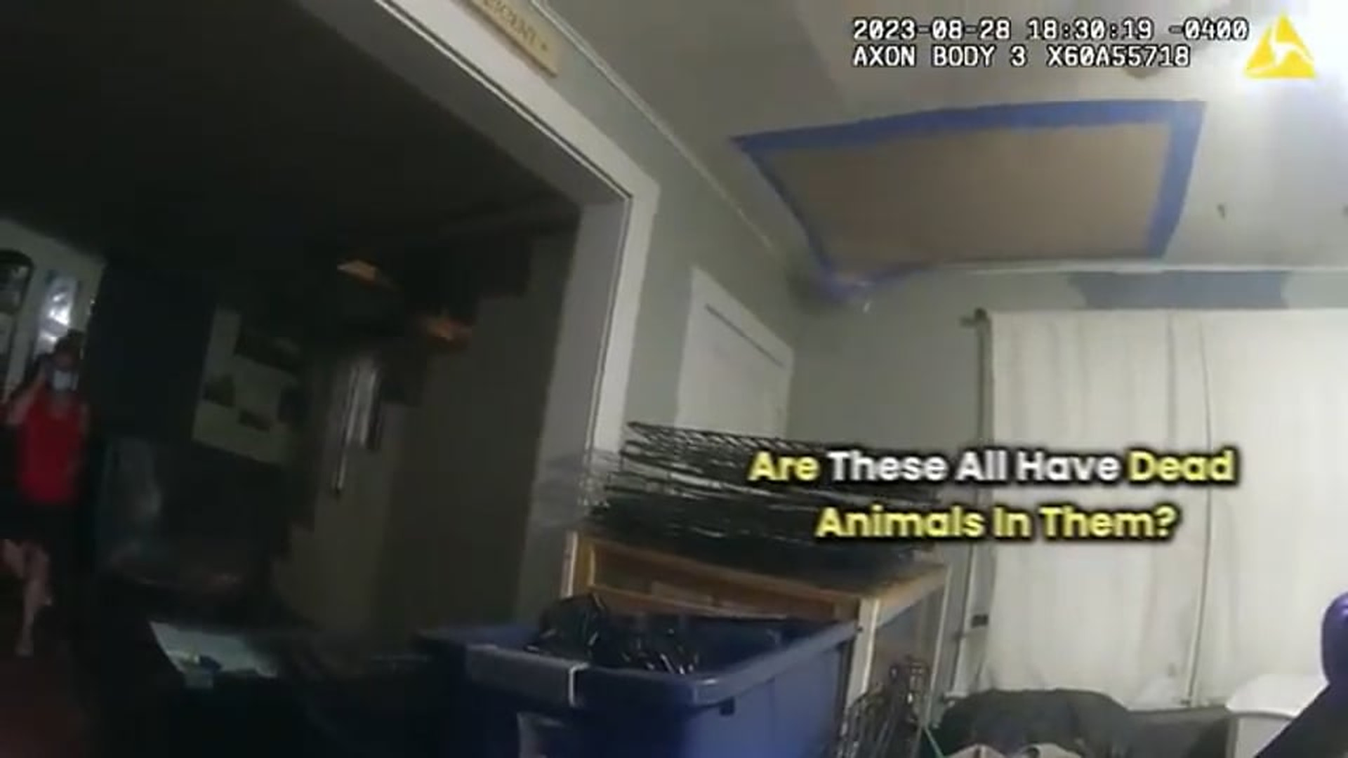 H1308043_Child Found Living in Home With 30 Dead Dogs, Couple Arrested (Police Bodycam)